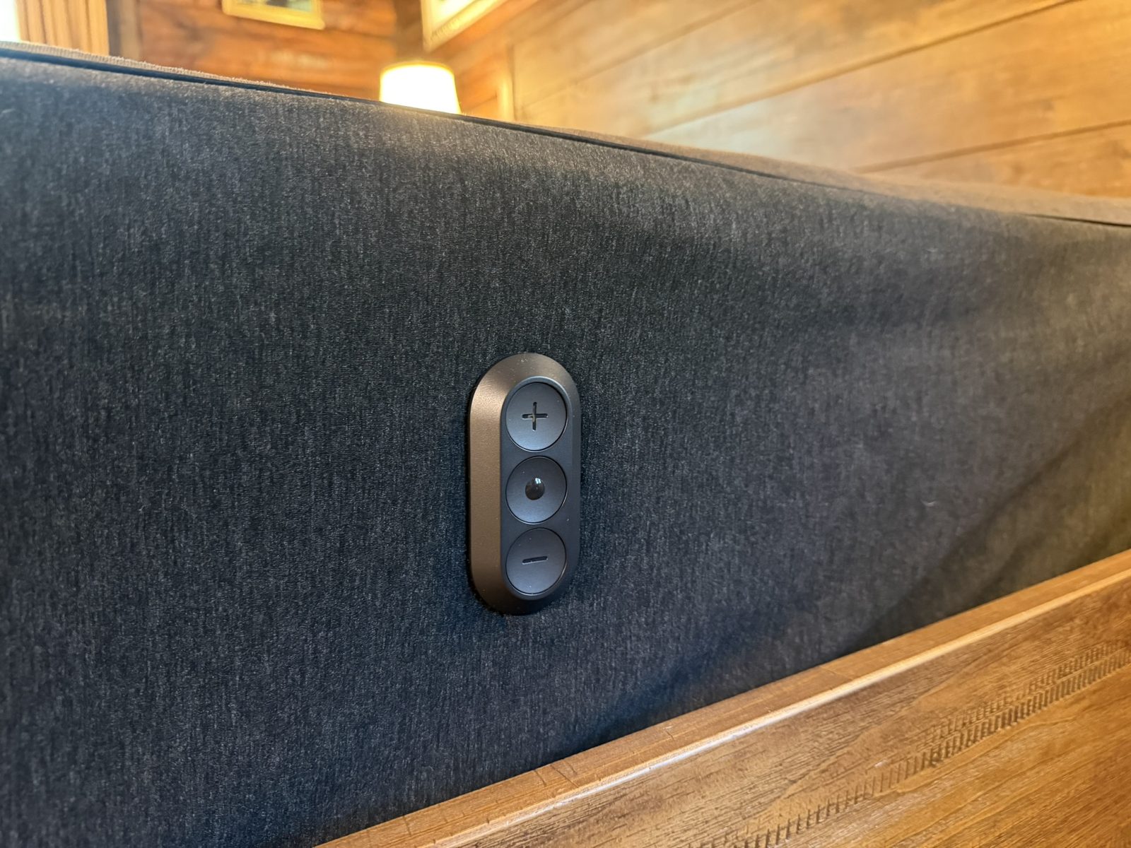 Physical temperature control buttons on the side of the Eight Sleep Pod 6 Cover
